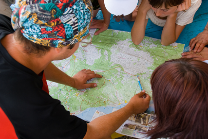 hikers looking at a map